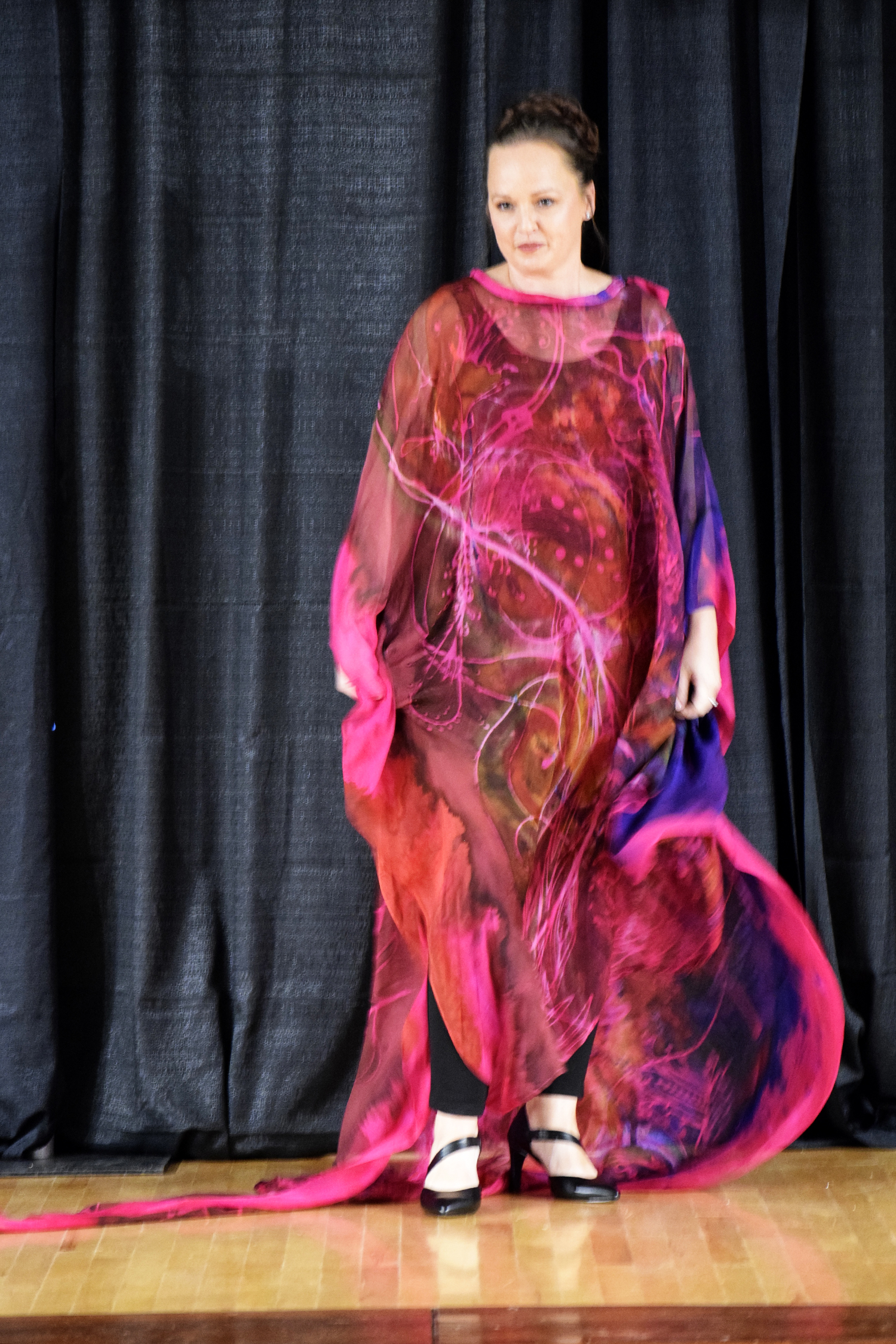 Festival fashion show moment featuring Gail and David Higgins