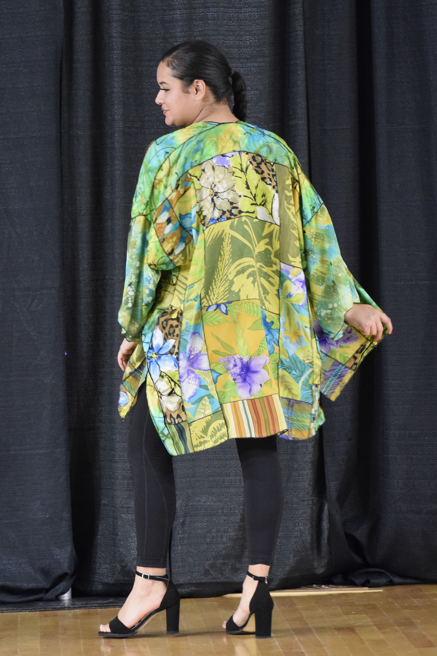 Festival fashion show moment featuring Leslie Rogers-Todder